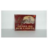 Metal motorcycle sign. Measures 12x16.