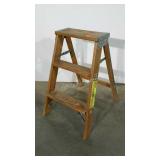 Wooden two step ladder. 22" high.