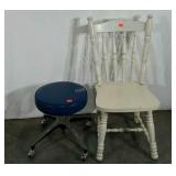 Chair and vinyl adjustable stool, back of the