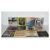 12 vinyl records. Artists include The Monkeys,
