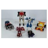 Group of Transformers toys, action figures