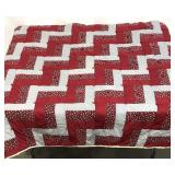 Knotted quilt, filler has shifted as seen on