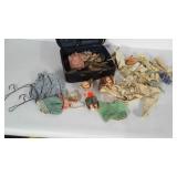 2 dolls and miscellaneous doll clothing in an old