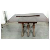 Drop leaf table, needs work, finish is damaged