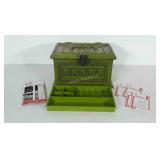 Poly sewing box with thread and needles inside.