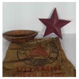 Metal star wall decor, wooden bowl and burlap