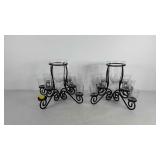 Pair of metalworks candle holders, missing one