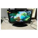 SHARP 26" flat screen TV on stand. No remote.