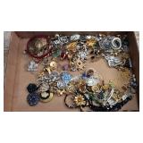 Flat of costume jewelry