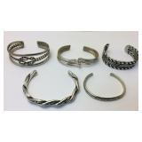 Five cuff bracelets