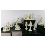 Seven Department 56 snow babies figurines with