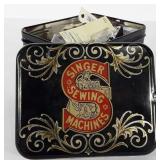 Singer tin full of buttons and notions