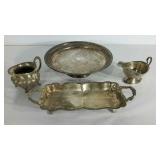 Four serving pieces of silverplate. Gravy boat,