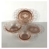 Pink Depression glass bowls and plate