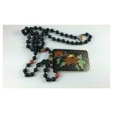 Black beaded enamel pendant necklace