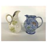 Two pottery pitchers, white is Lenox and blue is