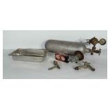 Beer tap handle, levers, CO2 tank and pan.