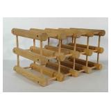 Natural wood wine rack. Holds 8 bottles. Base