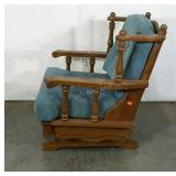 Upholstered spring rocker.