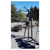 Exercise Equipment, pull up, curls type machine.