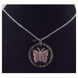 Butterfly pendant with a silvertone chain 20in