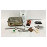 Tin with watches, jewelry, etc