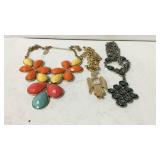 Three costume necklaces