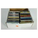 Flat of 26 CDs. Assorted artists and genres.