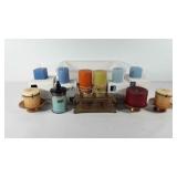 Rubbermaid storage tote full of candles, includes