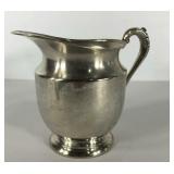 Silver on copper pitcher