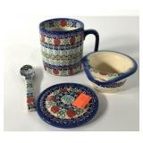 Signed Polish Pottery mug with spoon, strainer