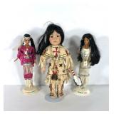 Native American dolls, two Barbies and a Buffalo