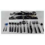 Box of flatware, includes spoons, knives, forks,