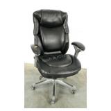 Executive desk chair on wheels. Adjustable.