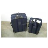 Two Samsonite expabdable, roller suitcases.