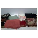 Pillow shams, tablecloths, Nike cap and purses