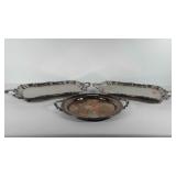 Three silver serving trays, includes round