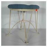 Vanity stool. Cloth on seat shows age as does
