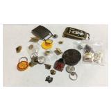 Belt buckles, pins, key chains etc