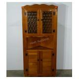 Corner cabinet, round swirl design in amber