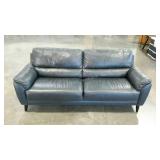Abbyson leather sofa, navy blue. 80" long. Seller