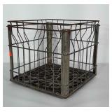 Metal Galliker Dairy crate with plastic bottom.