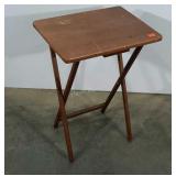 Single folding TV tray. Shows blemishes. Seller