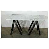 Foyer or sofa table made from saw horses and tone