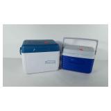 Two rubbermaid coolers with handles, one has