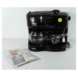 DeLonghi espresso maker, powers up