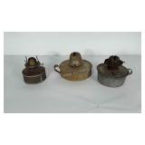 3 metal oil lamp bases. Base diameters range from