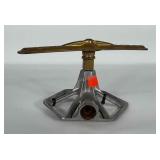 Cast base sprinkler by Groundwork.