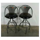Pair of swivel barstools with vinyl seats. Seat