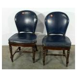 Two leather side chairs. Made by Milwaukee Chair